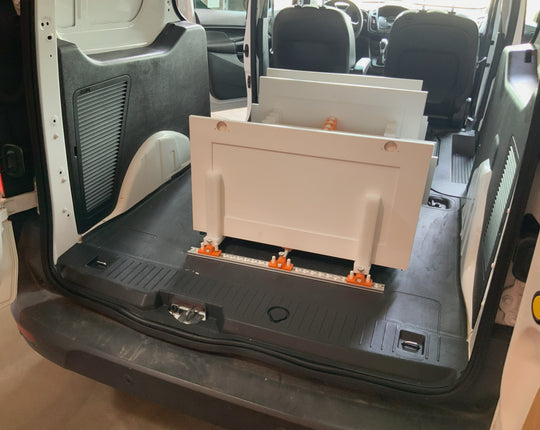 PRODRYINGRACK TRANSPORT (PDRTR) BEING USED IN BACK OF VAN WITH CABINET DOORS