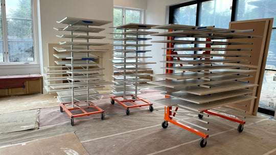 PRODRYINGRACK KD (PDRKD) TWO IN USE WITH A PRODRYINGRACK EX (PDREX), ALL WITH WHITE CABINET DOORS ON THE RACKS