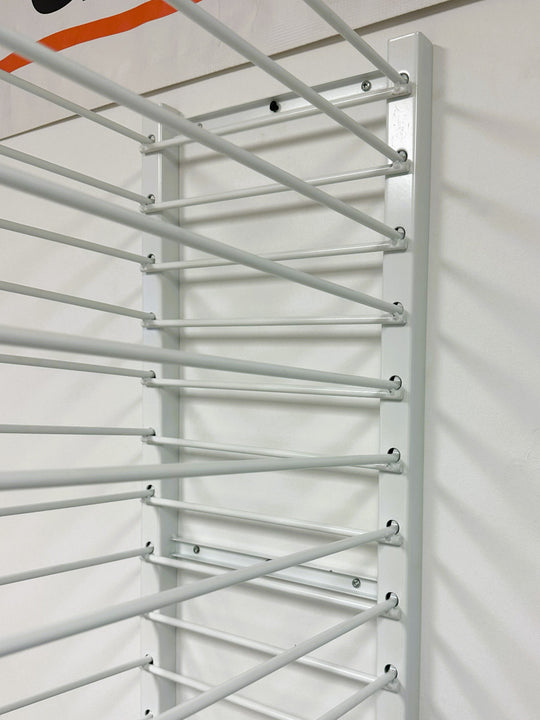 CLOSEUP OF PRODRYINGRACK WALL MOUNT (PDRWM) MOUNTED ON WALL.
