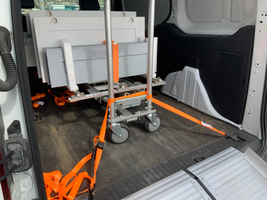 PRODRYINGRACK TRANSPORT (PDRTR) HANDTRUCK STRAPPED DOWN IN VAN WITH CARGO TIE-DOWN SYSTEM