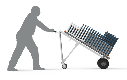 Silhouette of worker pushing Handtruck cart loaded with ProDryingRack Transport