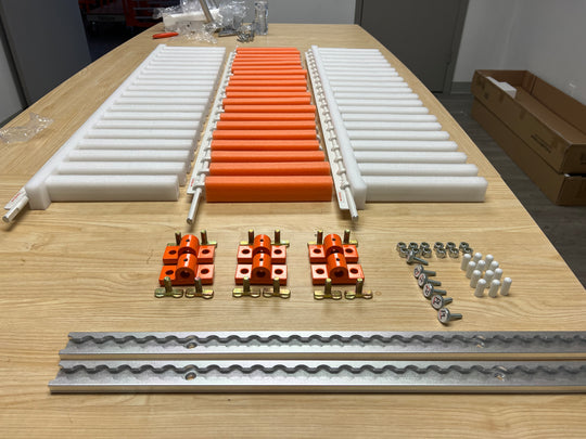 PRODRYINGRACK TRANSPORT (PDRTR) COMPONENTS LAID OUT ON TABLE