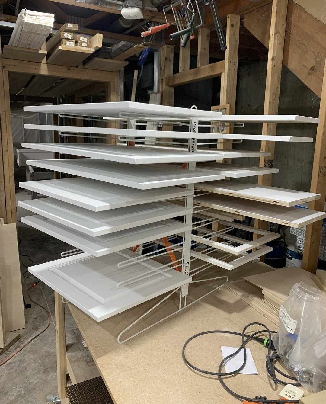 PRODRYINGRACK TT (PDRTT) IN USE BY CUSTOMER WITH WHITE CABINET DOORS ON RACK