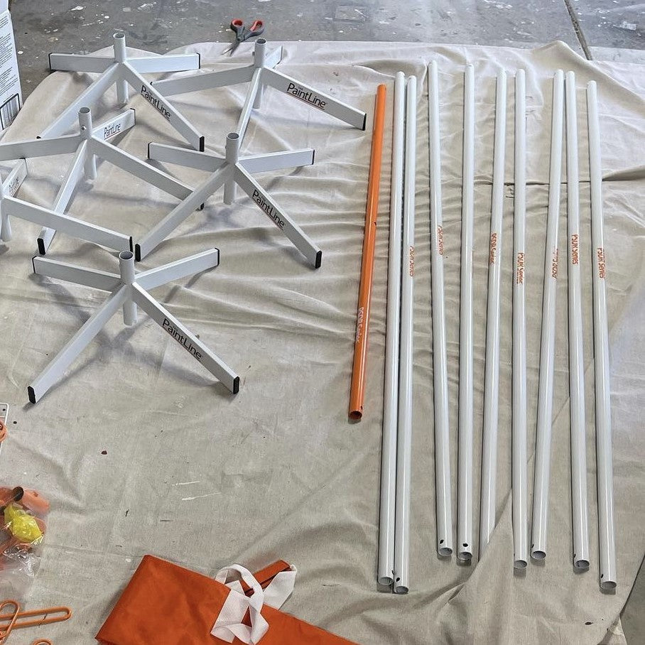 PRODRYINGRACK SD (PSDR) SERIES COMPONENTS LAID OUT ON FLOOR TO SHOW POLES AND BASES