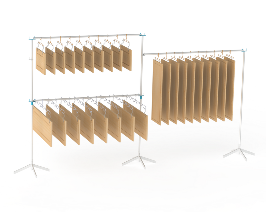 Metal rack system with metal hangers holding cabinet doors for drying on multiple levels