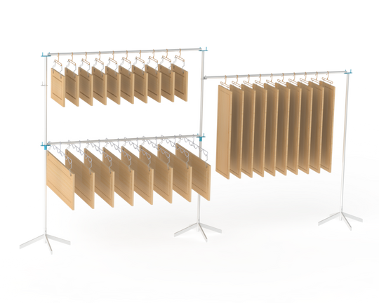 Metal rack system with metal hangers holding cabinet doors for drying on multiple levels