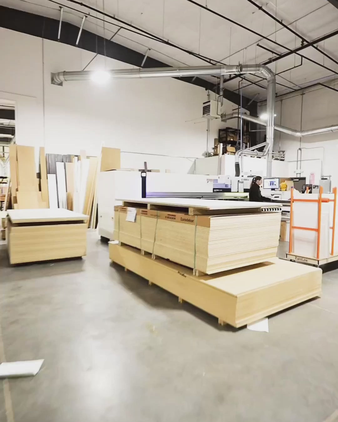 PaintLine's ProCart being used by customers in multiple workshop settings.