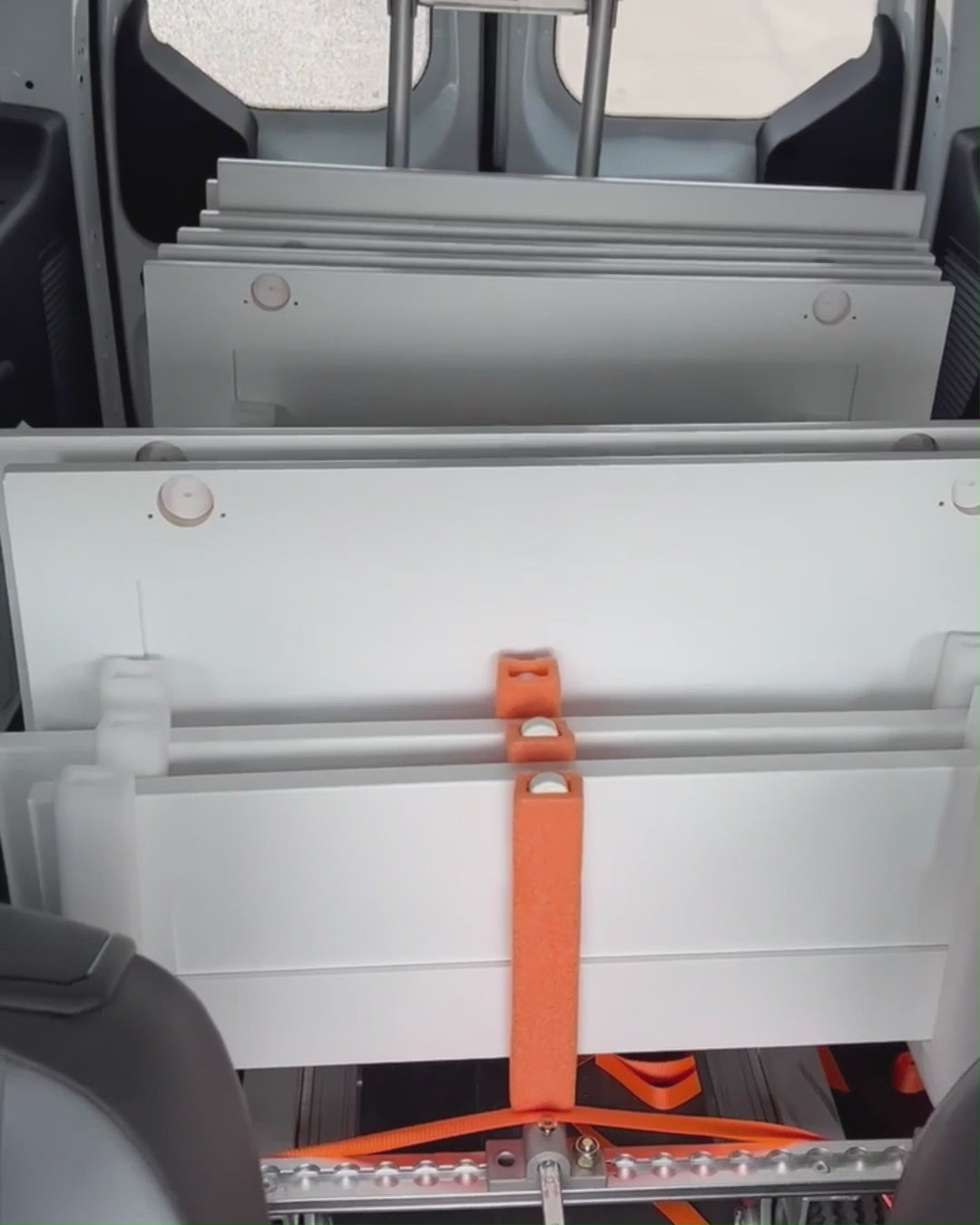 PaintLine's cabinet door transport rack being used by customers in multiple van and workshop settings.