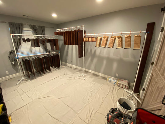 PSDR HEIGHT EXTENDERS IN USE CUSTOMER IMAGE WITH CABINET DOORS DRYING VERTICALLY ON RACK